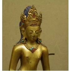 Padmapani Lokeswor, cross on the necklace, solar disc